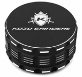 Kozo 4 inch four-piece non-stick aluminum grinder in black, closed front view with the Kozo logo on the lid