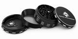 Kozo 4 inch four-piece non-stick aluminum grinder in black, taken apart into lid, body, screen ring and kief base
