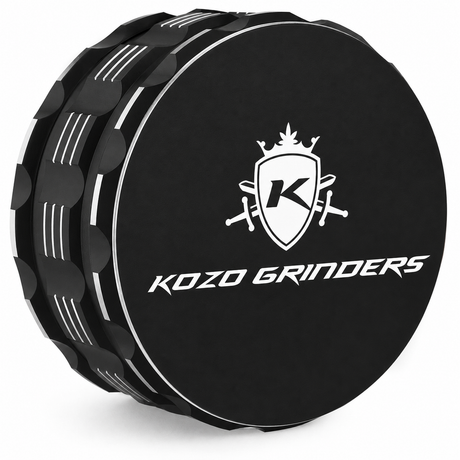 Kozo 3.5 inch ceramic non-stick aluminum grinder in black, angled view showing the grip notches and the Kozo logo lid