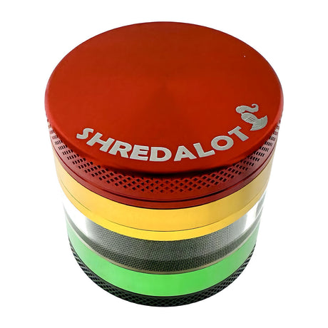 Sir Shredalot 4-Part Clear Catcher Chamber Grinder in Red, Yellow, and Green