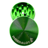 Sir Shredalot 2-part Grinder in green, top view with lid off showing sharp teeth