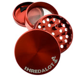 Sir Shredalot 4-part Grinder 63mm in red with sharp teeth and kief catcher, top view