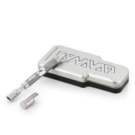 DynaVap The M 7 XL vaporizer with the cap off, positioned next to its included DynaVap tin storage case.