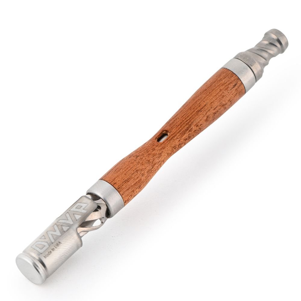 DynaVap WoodWynd Ipe angled close up shot highlighting the stainless steel crowns on the wood stem.