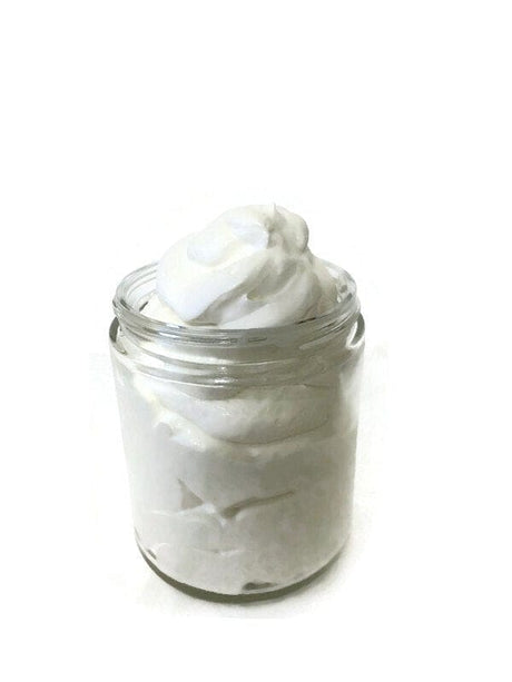 Elite Creed Natural Honeysuckle Body Butter, CBD infused, in an open jar with creamy texture