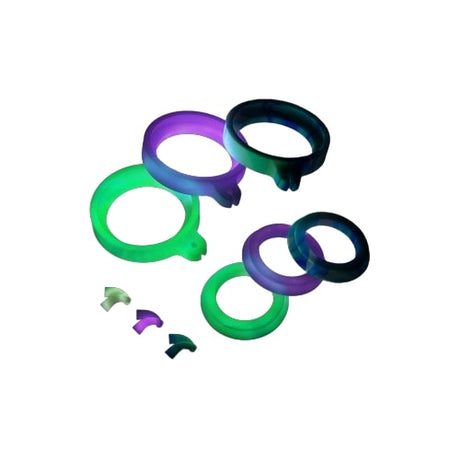 Dr. Dabber Switch Accessory Kit with glowing silicone seals and tweezer tips, top view