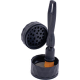 Snowtree Grinder Brush with black geometric design, angled view with open compartments