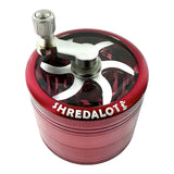 Sir Shredalot red 4-part crank top grinder with clear top view on white background