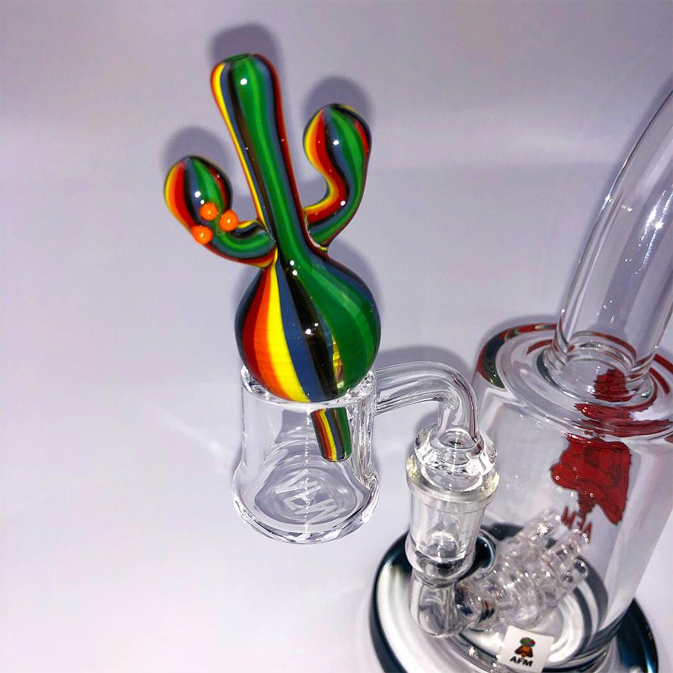 AFM Cactus Bubble Carb Cap in vibrant colors attached to clear dab rig, angled view