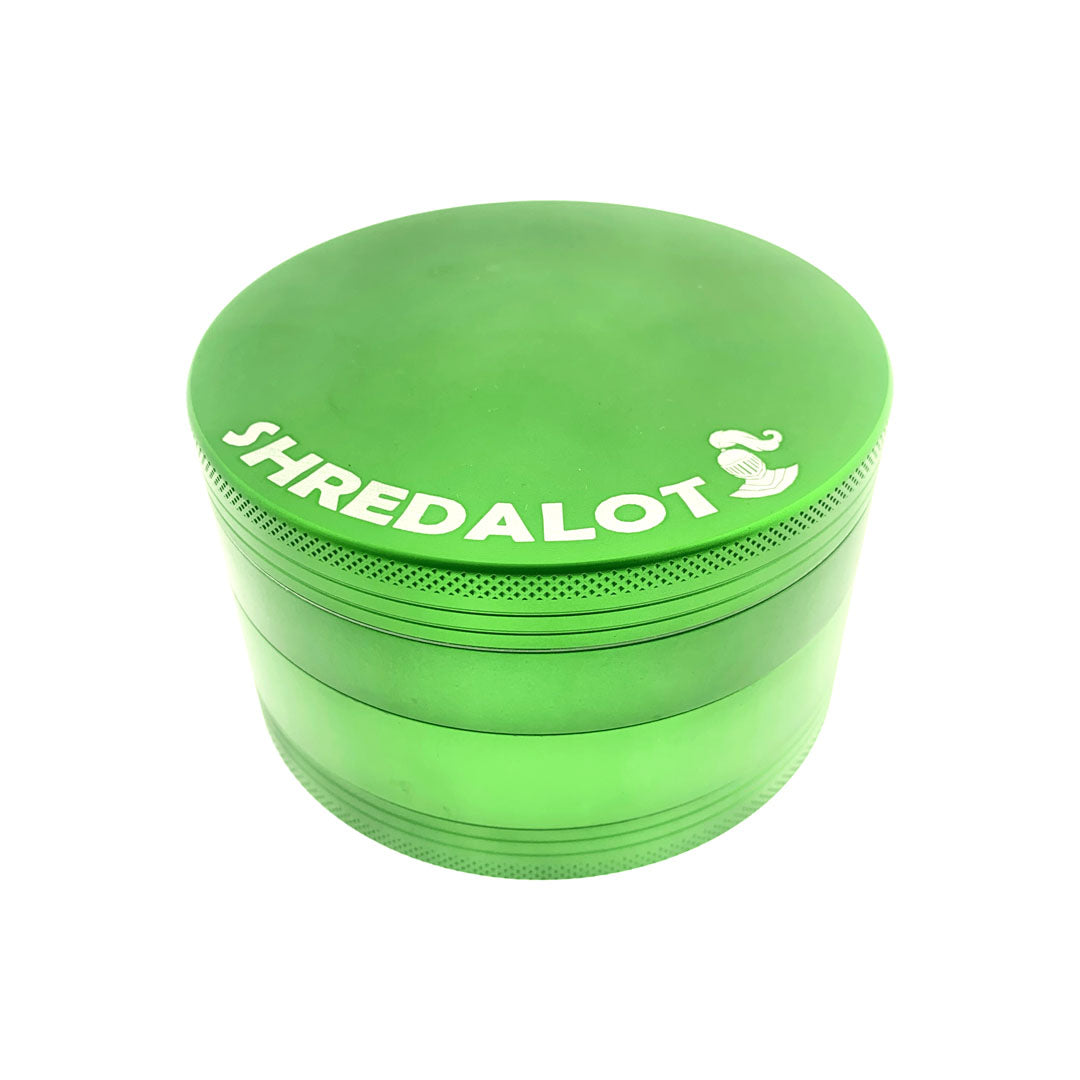 Sir Shredalot 4-part Grinder in vibrant green, 100mm size, top view on seamless white background