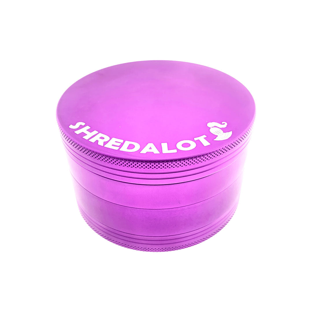 Sir Shredalot 4-part Grinder in vibrant purple, 100mm size, top view on white background