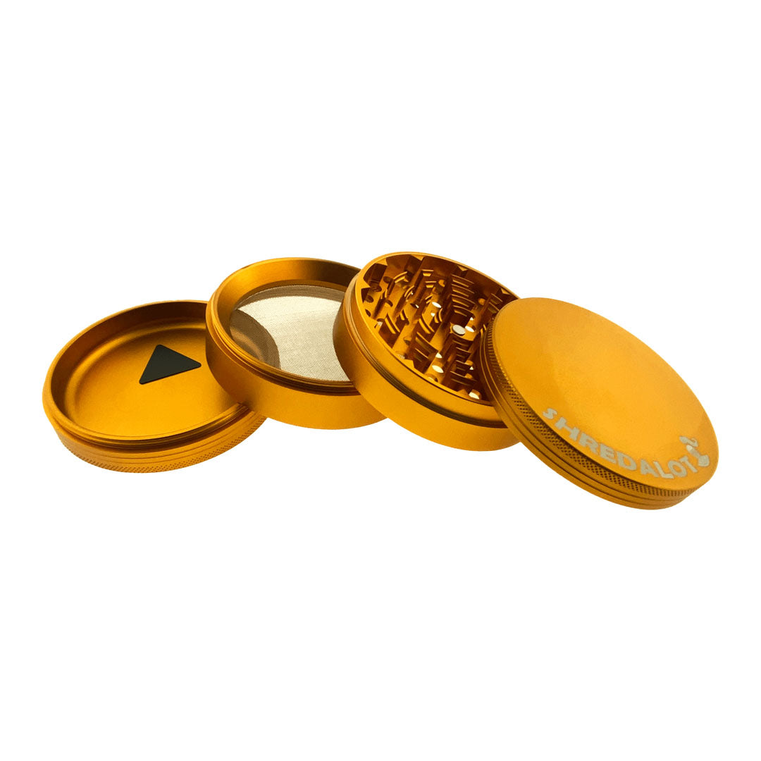 Sir Shredalot 4-part Grinder in Gold, 100mm, open view showing all compartments