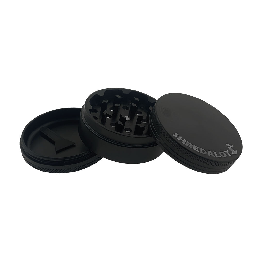 Sir Shredalot 3-Part Grinder 63mm in black, disassembled view showing sharp teeth and deep chamber