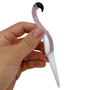 AFM Flamingo Glass Dabber Tool held in hand, perfect for precise dab rig use, with colored glass design