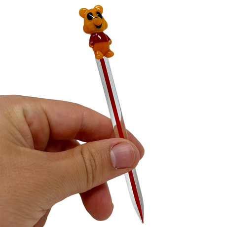 AFM Bear Glass Dabber Tool held in hand, clear with colored accents, for precise dab rig use