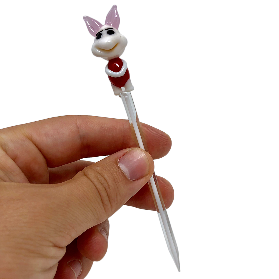 Hand holding AFM Bunny Glass Dabber Tool with detailed colored glass design, perfect for dab rigs