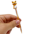 AFM Fox Glass Dabber Tool with detailed fox top, held in hand - clear background