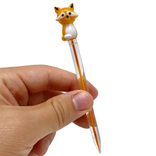 AFM Fox Glass Dabber Tool with detailed fox top, held in hand - clear background