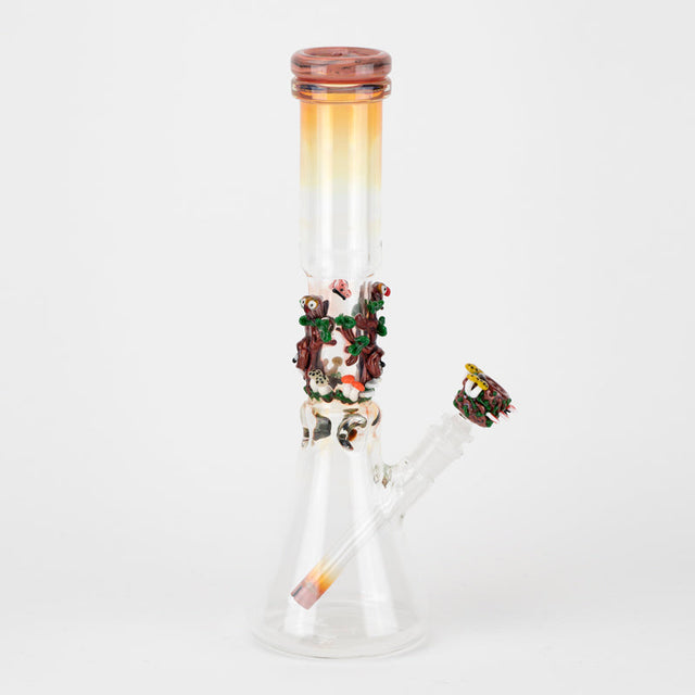 Empire Glassworks Forest Beaker Bong with intricate tree and mushroom design, front view on white background