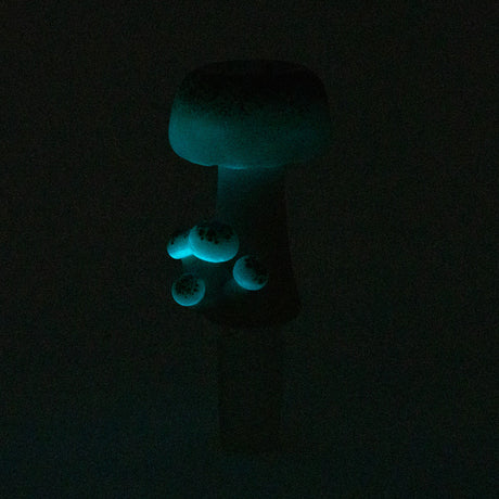 Empire Glassworks Funglow Bowl Piece glowing in dark, 14mm Borosilicate, angled view