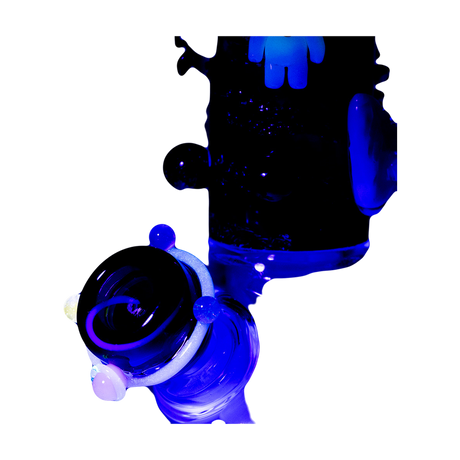 Empire Glassworks Galactic Baby Beaker under UV light, highlighting glow-in-the-dark features