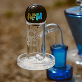 AFM Fireworks Quartz Dab Banger Set on display, clear view with AFM logo, outdoor background