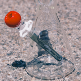 AFM 18" Atlanta Baseball Beaker Bong with red bowl, side view on concrete