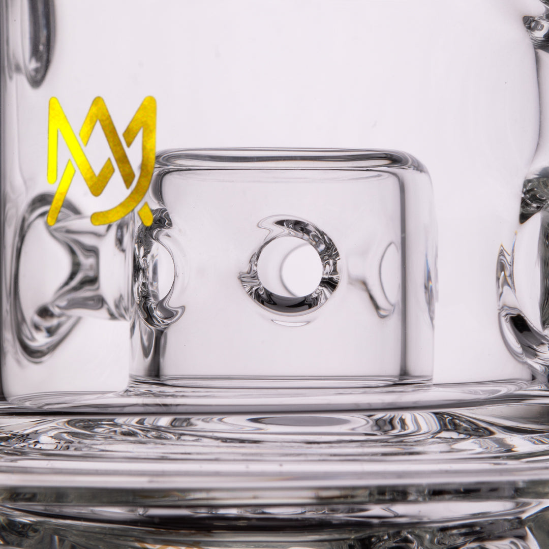 Close-up of MJ Arsenal The Plasma Core Rig percolator with yellow logo