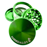 Sir Shredalot Clear Catcher Chamber Grinder in green, 4-part design with fine mesh screen