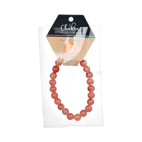 Chakra branded 3.5" Carnelian gemstone bracelet on display card, front view