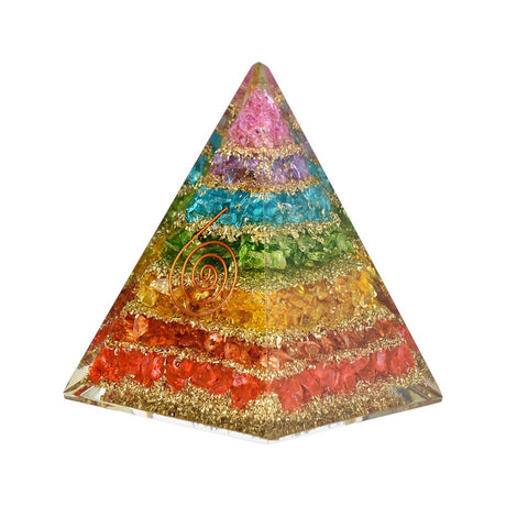 Chakra Orgonite Pyramid with vibrant layered stone design, front view on white background