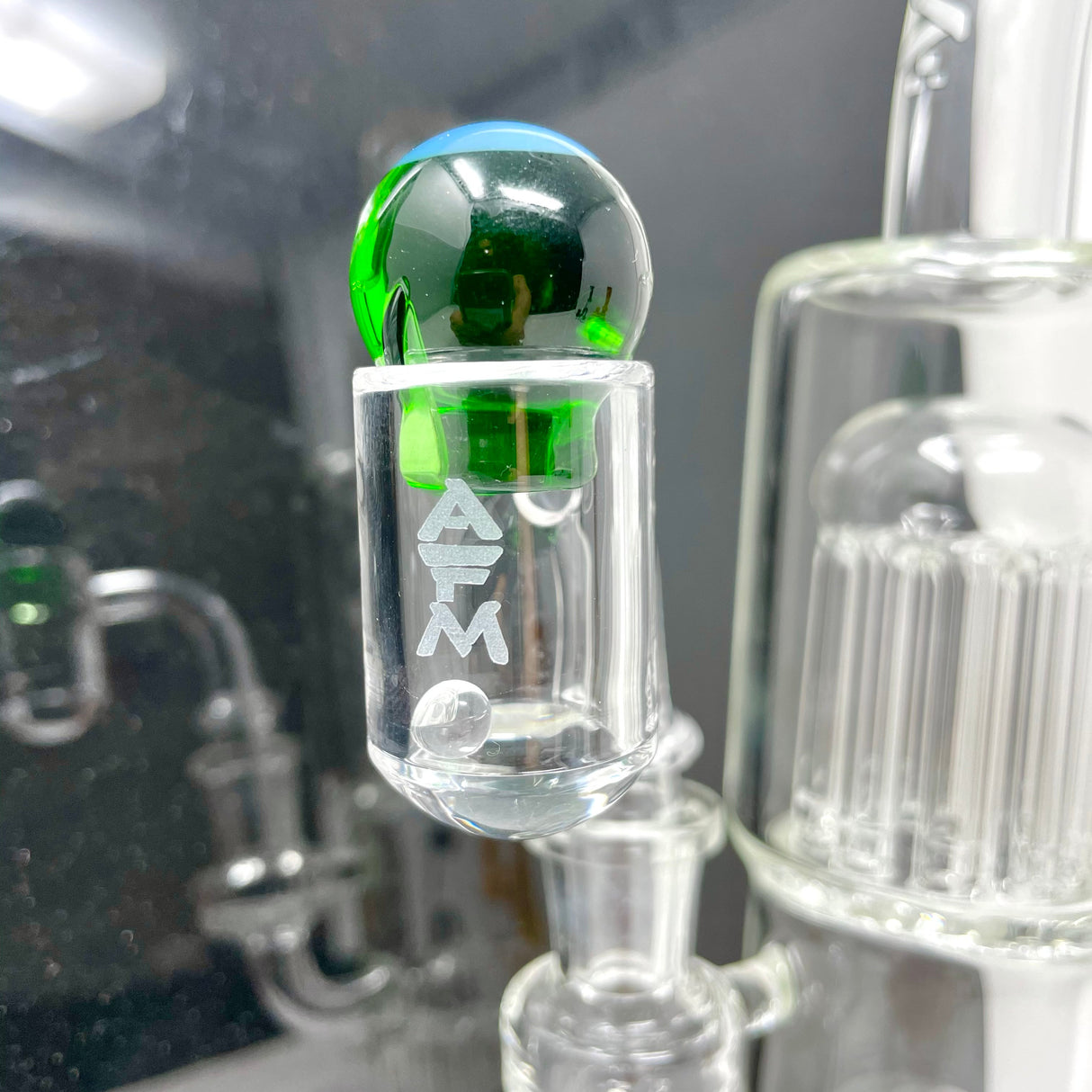 AFM Spinner Ball for Bongs - Close-up View with Green Glass Top