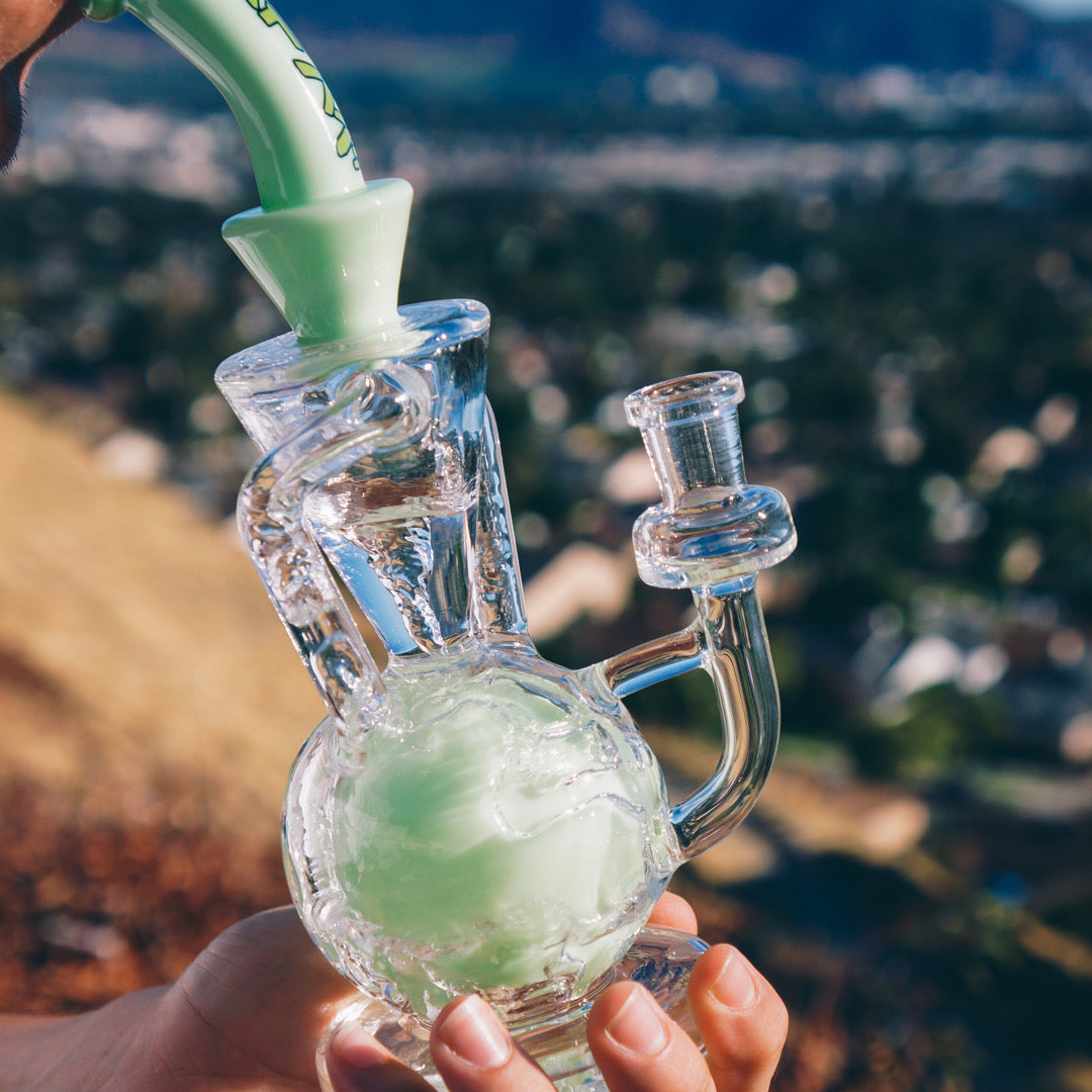 AFM 9.5" Magic Ball Clear Glass Recycler Dab Rig with Showerhead Perc in outdoor setting