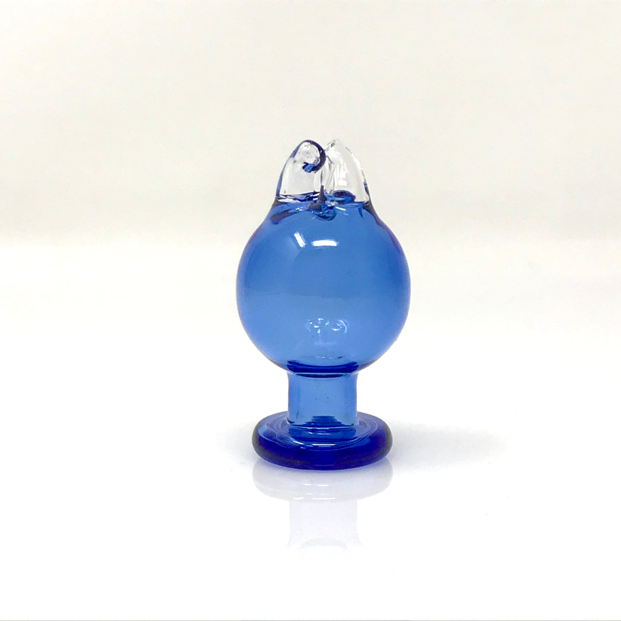 AFM Double Side Spinner Directional Carb Cap in blue, front view on seamless white background