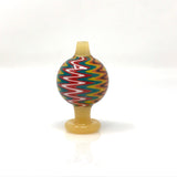 AFM Color Reversal Bubble Carb Cap front view, borosilicate glass with vibrant zigzag pattern