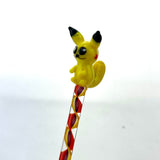 AFM Pikachu Glass Dabber Tool with red and white spiral handle, front view on a white background