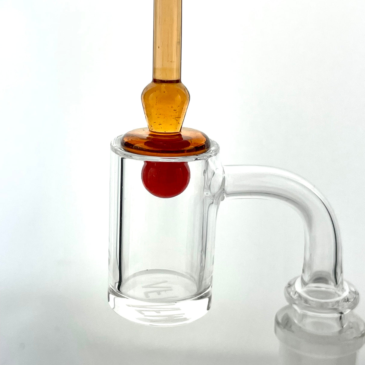 AFM Colored Glass Dabber and Carb Cap Combo on Dab Rig, Close-up Side View