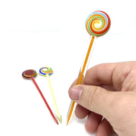 AFM Lolly Pop Glass Dabber Tool with colorful swirl design held in hand, clear background