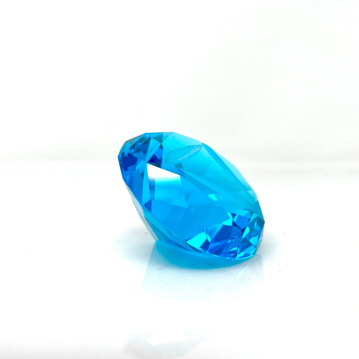 AFM Diamond Spinner Cap in brilliant blue, borosilicate glass, angled side view on white background