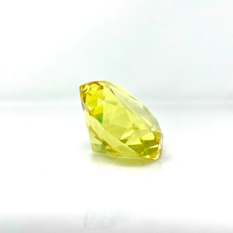 AFM Diamond Spinner Cap in yellow borosilicate, angled view on seamless white background