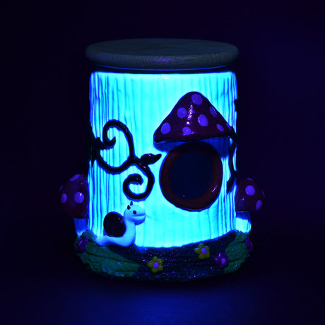 Pulsar Shroom House Glass Jar glowing in dark, front view, ideal for storing rolling accessories