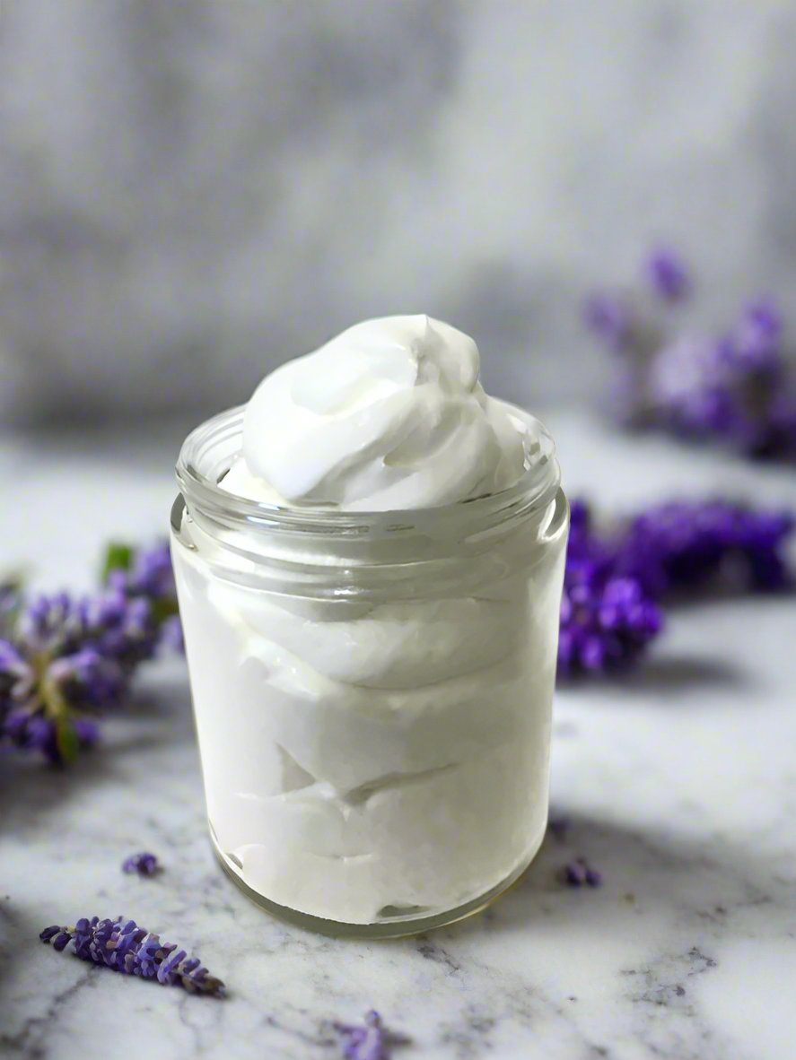 Elite Creed Natural Lavender Whipped Body Butter in a glass jar, CBD infused, with lavender sprigs