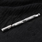 DynaVap The M 7 XL vaporizer resting on a textured fabric background, showing the full stainless steel body.