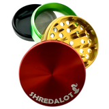 Sir Shredalot 4-Piece Metal Herb Grinder in Red, Gold, and Green with Sharp Teeth - Top View