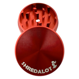 Sir Shredalot 2 Piece Metal Herb Grinder in Red, Top View with Sharp Teeth Visible