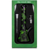 The Weed Box 10 inch Oogie Boogie beaker bong in branded green packaging, black glass with green artwork
