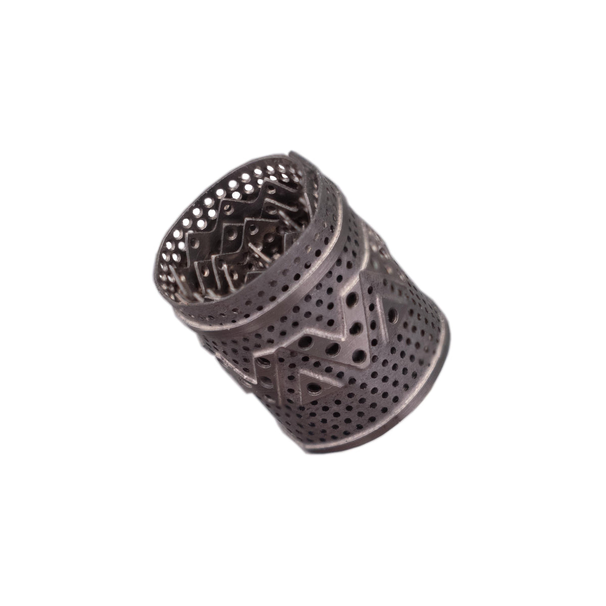 DynaVap DynaCoil titanium concentrate adapter shown lying horizontally to display its coiled shape