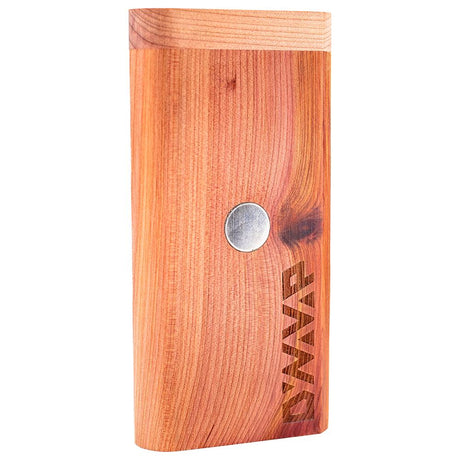 DynaVap DynaStash Cedar wood storage case shown from the side, displaying the cedar grain and rounded profile.