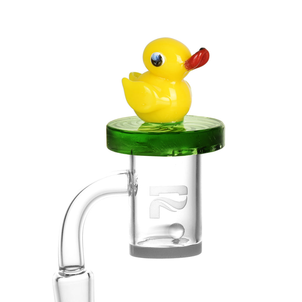 Air Spin Channel Carb Cap with cute yellow duck topper on a quartz bucket, clear side view