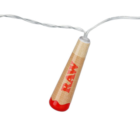 Close-up of RAW Cone LED Party Light shaped like a rolling paper on white background